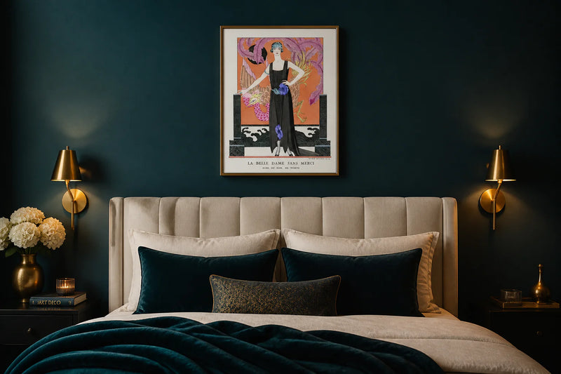 George Barbier Art Deco print in a gold frame above a luxe teal headboard with brass sconces