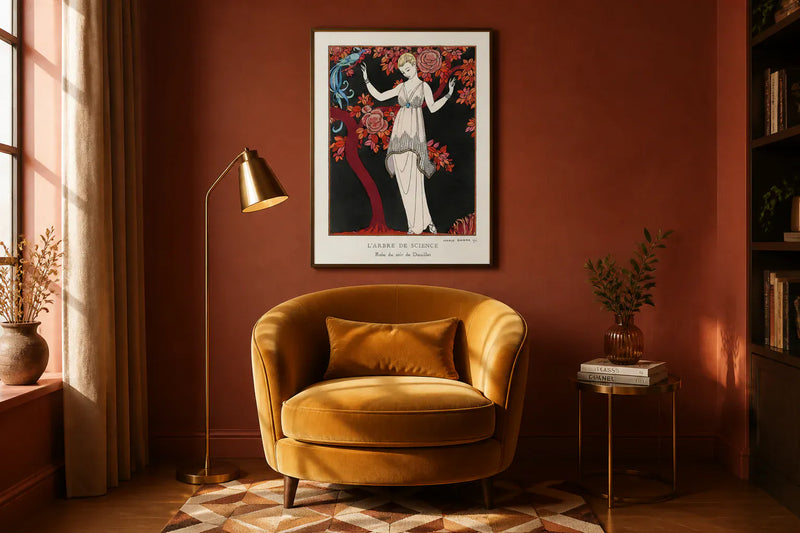 Art-deco figure print in a dark frame hung above a mustard velvet armchair against a terracotta wall