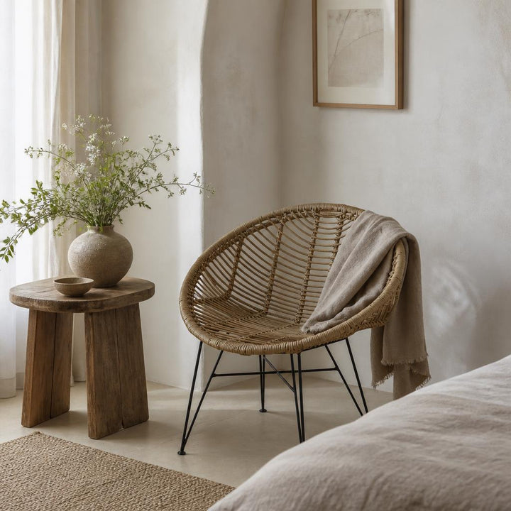 Round Rattan Chair on Metal Legs styled in a room