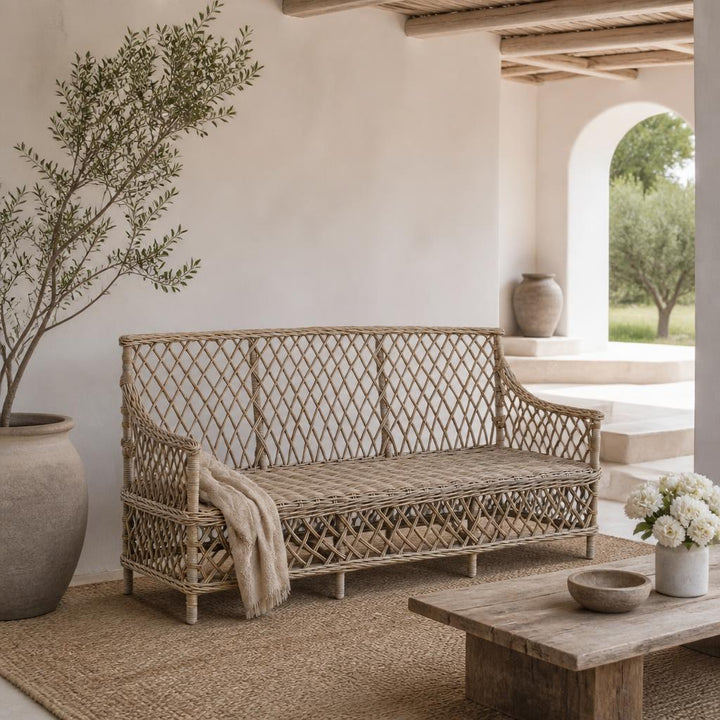 Lattice Rattan Three-Seater Sofa styled in a room