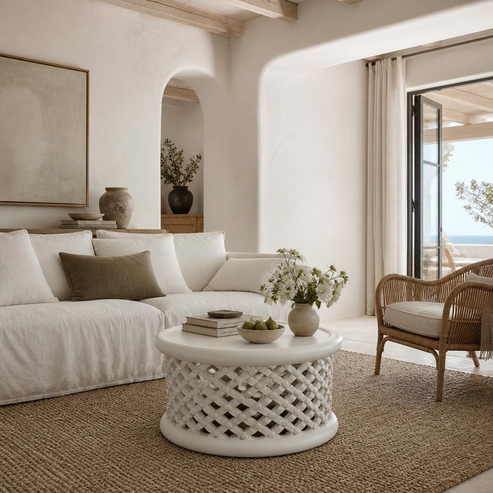 White Bamileke Stool, Ø80 × H40 cm as a coffee table in an airy coastal living room