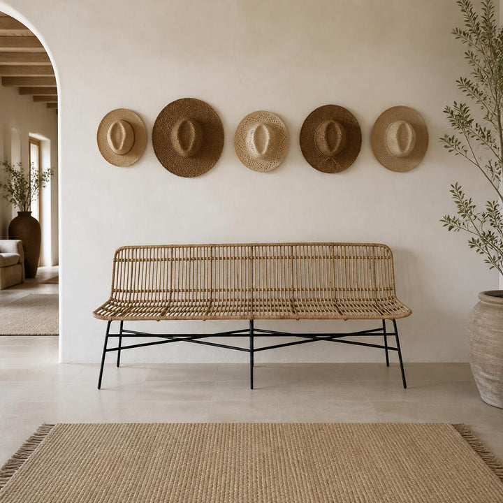 Long Rattan Bench on Metal Legs styled in a room