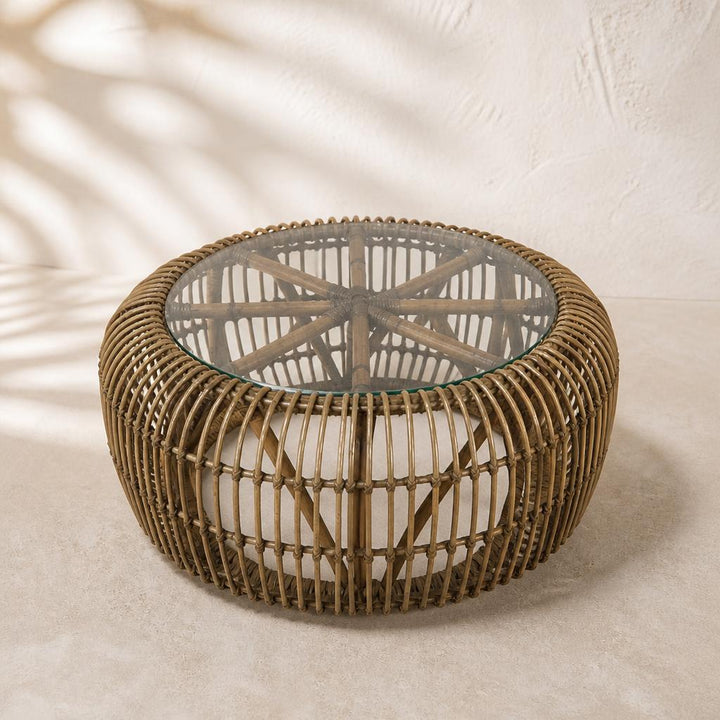 Spoke Rattan Coffee Table with Glass Top, studio view