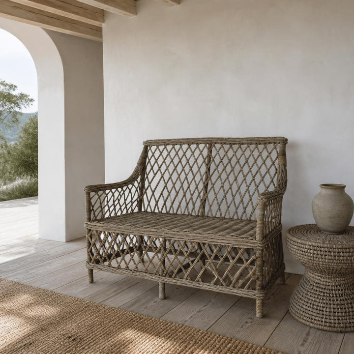 Lattice Rattan Two-Seater Sofa styled in a room