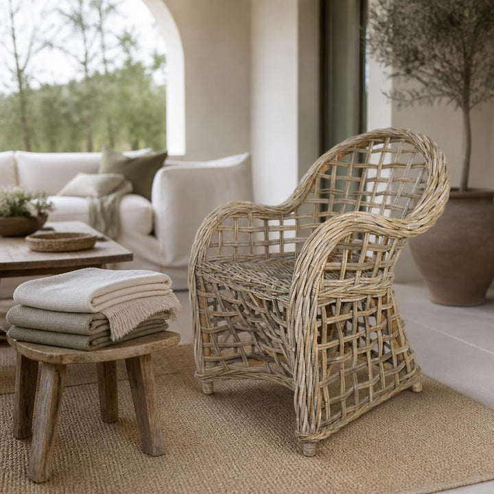 Open-Weave Rattan Dining Chair styled in a room