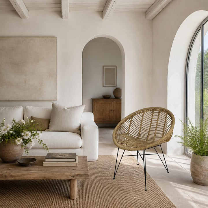 Round Rattan Chair on Metal Legs styled in a room