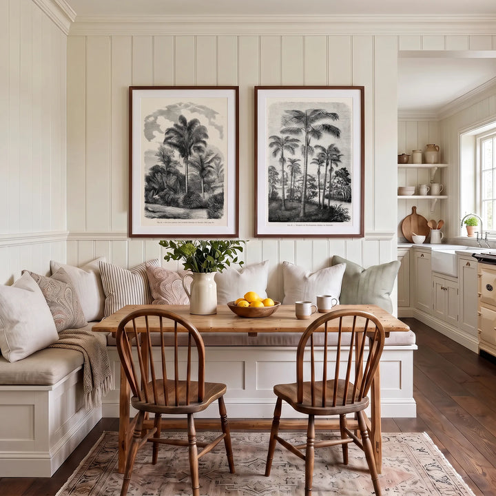 Queen Palm and Solitaire Palm Vintage Palm Pair framed above a kitchen banquette