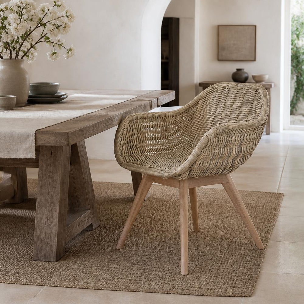 Scoop Rattan Armchair with Wooden Legs styled in a room
