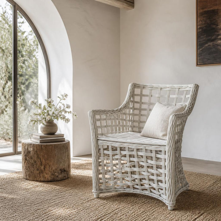 White Open-Weave Rattan Armchair styled in a room