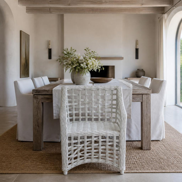 White Open-Weave Rattan Armchair styled in a room