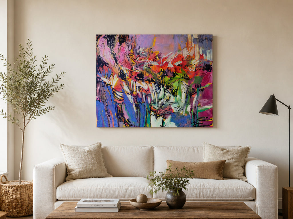 Large canvas wall art hung above a linen sofa, sized to about two-thirds of the sofa width